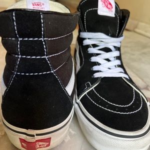 High-top Black/White Vans